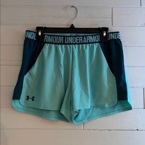 Under armor heat gear Womens running shorts
Turquoise 
Large